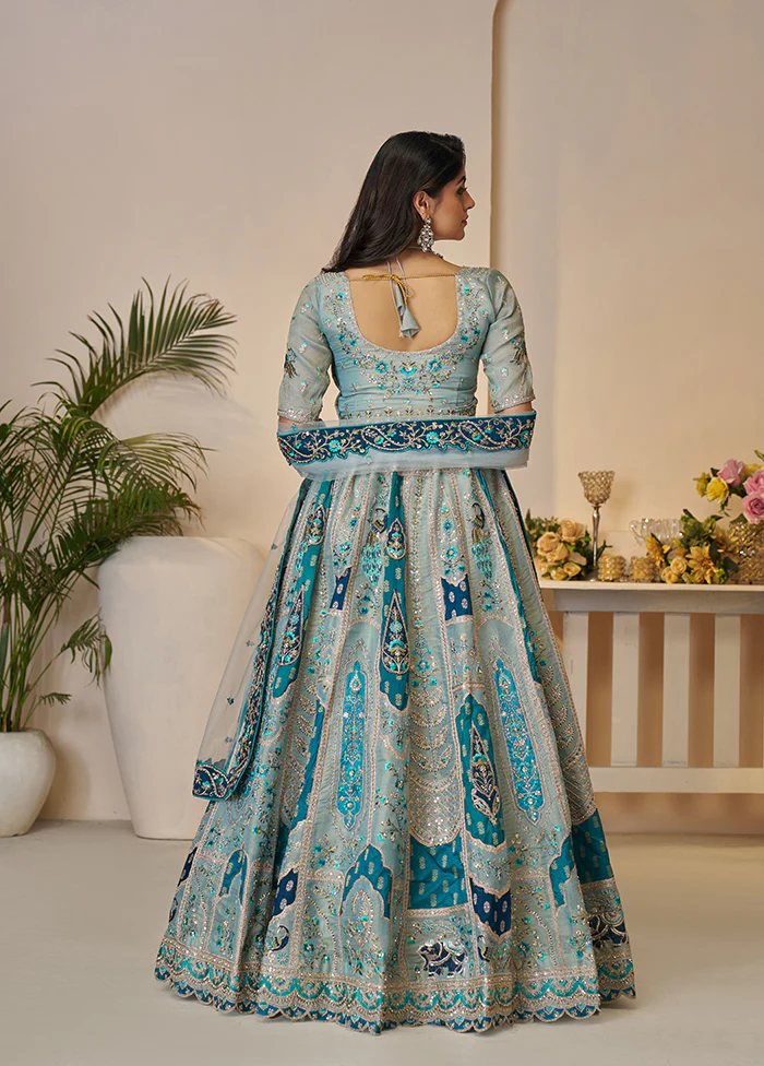 3 Pc Sky Blue Silk Semi Stitched Lehenga Set - Image 3