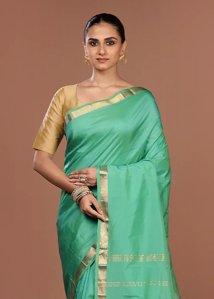 Green Kanjivaram Silk Saree With Blouse Piece