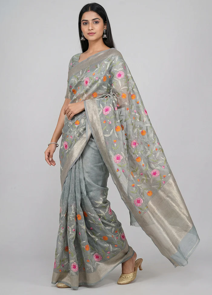 Green Tissue Silk Saree With Blouse Piece